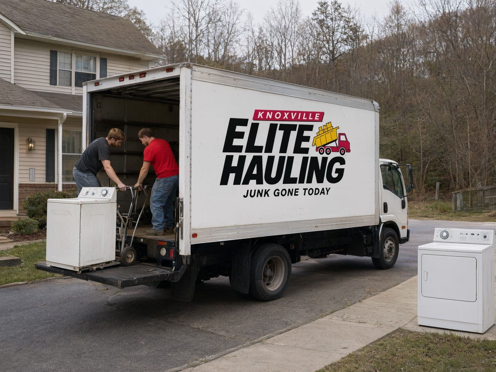 Appliance removal in Knoxville: crew loading an old washer onto the branded junk removal truck while a dryer waits on the driveway